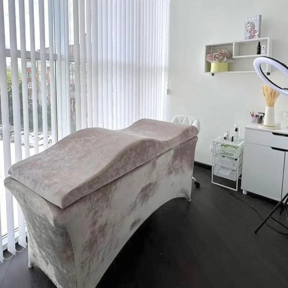 سرير تمديد الرموش بتصميم منحني - مراجعة Changing Table Topper وسعره