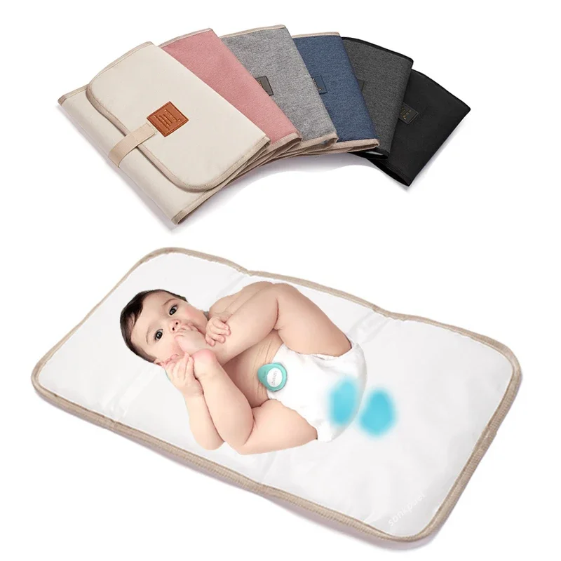 وسادة تغيير حفاضات الأطفال الق - مراجعة Changing Table Topper وسعره